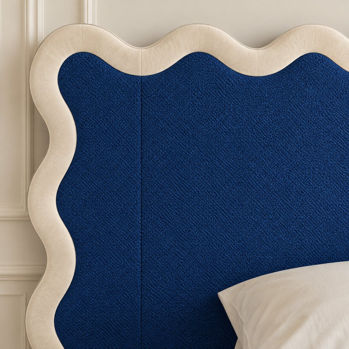 Brindisi bed in blue with cream border, headboard close-up