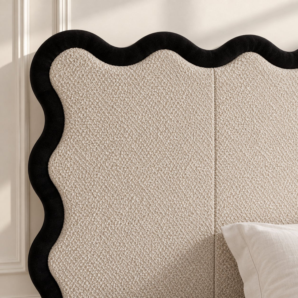 Brindisi bed in cream with black border, headboard close-up